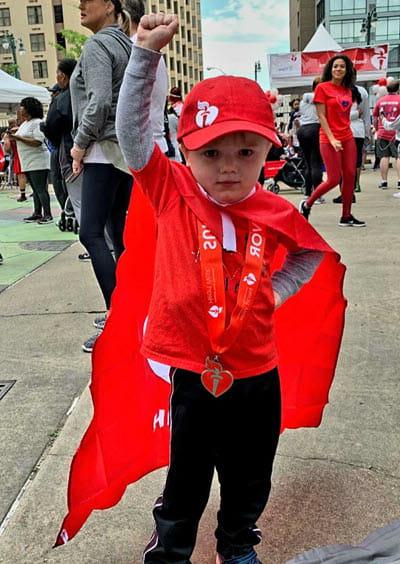 Jackson at AHA event wearing red cape