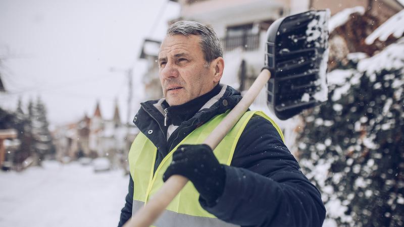 man shoveling snow