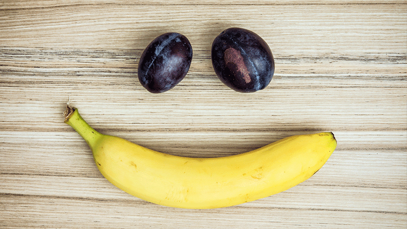 Banana and grape smiley face